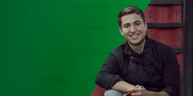 Image of Jay Rhind sitting on stairs